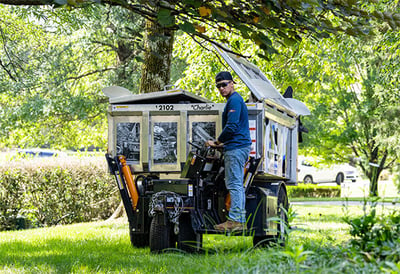 Equipter 4000 driving across a lawn